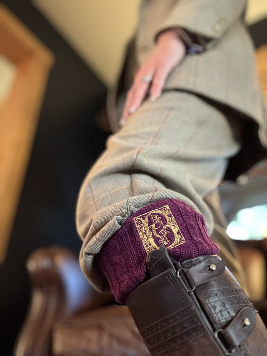 Purple Blixt monogram shooting socks above custom Spanish boots
